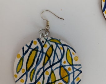 Handpainted abstract design original art jewelry; earrings wooden; design. Yellow and Blue earrings circle shaped Linda Snider Ward