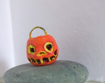 Creepy tiny pumpkin made of air dried clay Handpainted with acrylics; pendant, charm, or cute display pumpkin less than 20 dollars