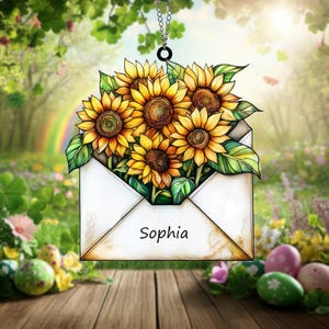 Carta blanca abierta con muchos girasoles en su interior. Atrapasol de cristal artesanal para amantes de las flores y decoración del hogar.