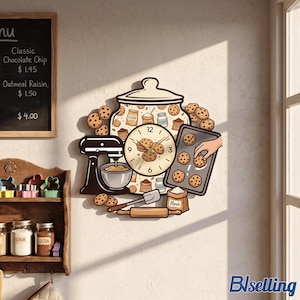 May include: A wall clock shaped like a kitchen scene featuring a large cookie jar, a stand mixer, a baking sheet with cookies, a rolling pin, and a spatula. The clock face is centered on the cookie jar with black numbers and gold hands.