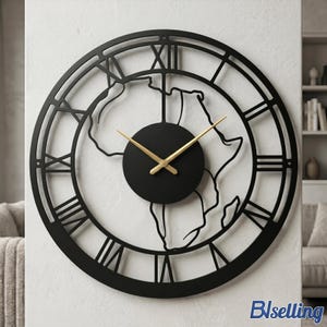 May include: A large, round black metal wall clock with a world map design. The clock features gold-colored hands and Roman numeral hour markers. The clock's design includes a cutout of the African continent. The clock is mounted on a white wall.