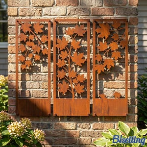 May include: A set of three rectangular metal wall panels featuring a laser-cut maple leaf branch design. Each panel has a rusted, weathered brown finish and a solid base section, mounted vertically to display the intricate foliage pattern.