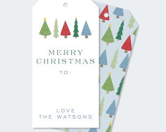 May include: A printable Christmas gift tag with a white background and a green border. The tag features a row of five stylized Christmas trees with red, green, and blue colors. The text "Merry Christmas to: Love The Watsons" is printed on the tag.