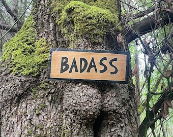 Photograph of "BADASS" Sign, on an ass shaped tree anomaly, PNW