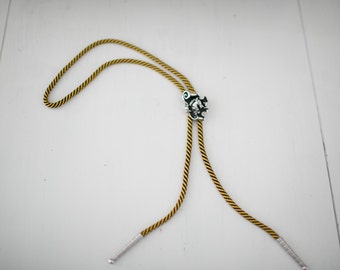 Vintage Western Swank Black, Yellow & Silver Horse Head Bolo Tie