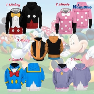 May include: A collection of five character-themed hoodies featuring designs inspired by Mickey, Minnie, Goofy, Donald, and Daisy. Each hoodie displays front and back views, showcasing specific color schemes, patterns, and iconic details like bows, buttons, and sailor collars.