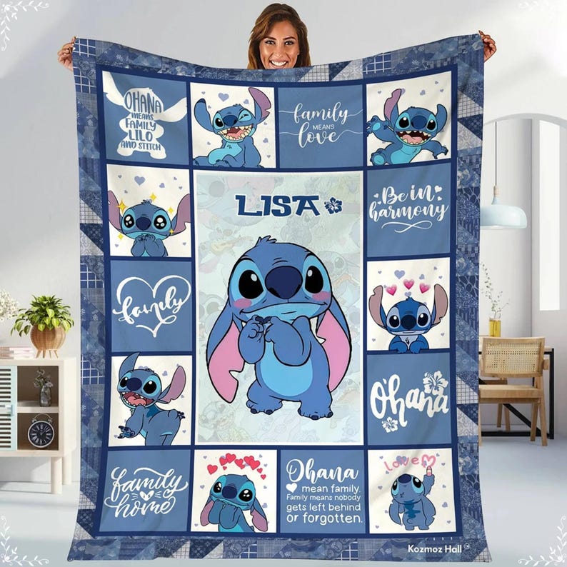 A woman is holding up a quilt featuring various images of the Lilo character from the Disney movie Lilo & Stitch.