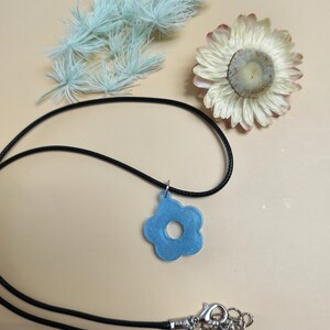 Small blue flower pendant