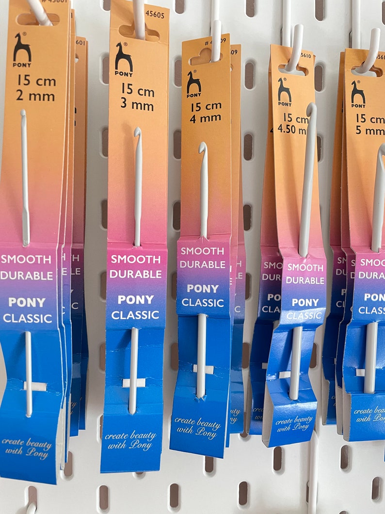 crochet hooks in light smooth aluminium metal by Pony. Sizes 2mm, 3mm,4mm,4.5mm and 5mm