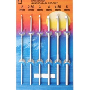 May include: A set of six white crochet hooks in a plastic package. The hooks are labeled with their sizes in millimeters: 2 mm, 2.50 mm, 3 mm, 4 mm, 4.50 mm, and 5 mm. The package is orange and blue with the text "CROCHET HOOKS, CROCHETS, H&Auml;KELNADELN, GANCHOS PARA CROCHET, MADE IN INDIA".