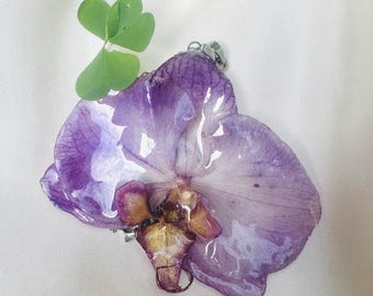 Hanger van echte orchidee van hars, roestvrijstalen ketting, handgemaakte bloemensieraden