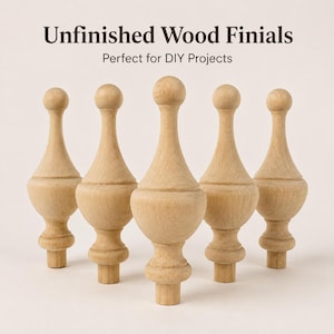 May include: Five light-colored, unfinished wood finials arranged in a group. Each finial features a spherical top, a tapered neck, a bulbous midsection, and a cylindrical base. The text "Unfinished Wood Finials" and "Perfect for DIY Projects" is visible.