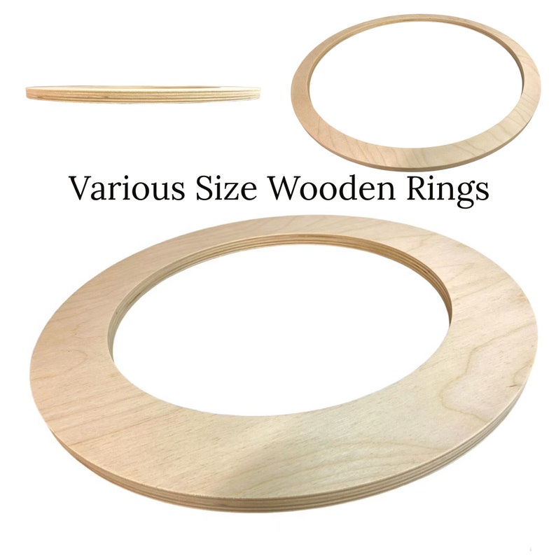 May include: Various Size Wooden Rings. A set of three unfinished wooden rings, ideal for crafting projects. The rings are made of natural wood and have a smooth, polished finish.