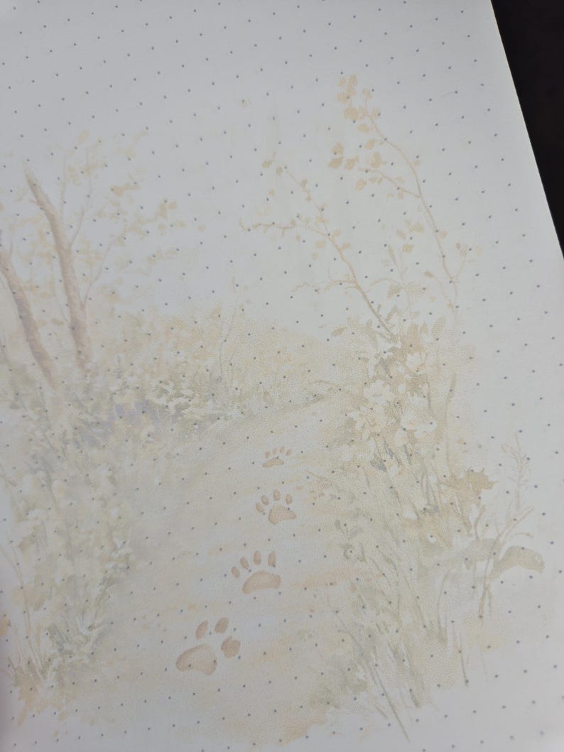 May include: Watercolor illustration of a forest path with paw prints. The artwork features a soft, muted color palette of beige, brown, and green, with trees and foliage lining the path. The background has a dotted pattern.