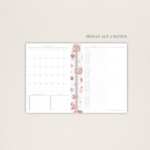 May include: A two-page spread planner with a calendar and lined pages. The left page displays a calendar for January 2022, and the right page has a daily schedule. The planner has a strawberry and jam jar design.