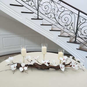 Driftwood Centerpiece: Magnolia Floral, Ivory Candle Holders & Flameless Candles