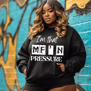 May include: Black sweatshirt with white text that reads "I'm that MF'N PRESSURE".
