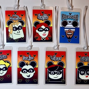 May include: Eight colorful luggage tags featuring characters from the animated film The Incredibles. Each tag has a character's name and a cartoon image of the character with Mickey Mouse ears. The characters are Mr. Incredible, Elastigirl, Frozone, Dash, Jack-Jack, Violet, and Edna Mode.