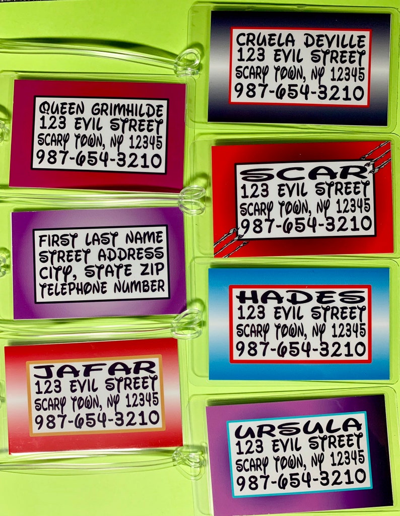 May include: Six colorful luggage tags with the names of Disney villains: Cruella DeVille, Scar, Hades, Jafar, Ursula, and Queen Grimhilde. Each tag has the villain's name, the address "123 Evil Street, Scary Town, NY 12345", and a phone number: 987-654-3210.