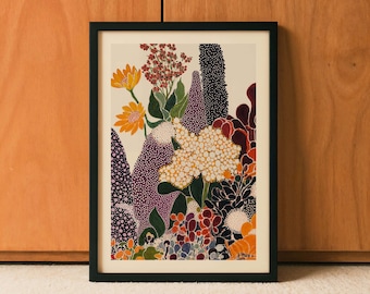 May include: A framed art print featuring a colorful floral illustration. The artwork showcases a variety of flowers in shades of orange, yellow, purple, and red, set against a cream background. The print is enclosed in a dark green frame.