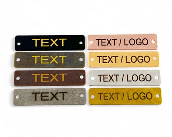 May include: Eight metal tags in different finishes, including black, bronze, copper, silver, and gold. Each tag has two holes and is engraved with the words "TEXT" and "TEXT/LOGO".