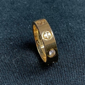 Anillo de bodas Cartier con banda de oro rosa