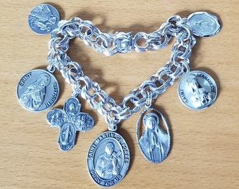 Saints Who Serve the Poor ... Vintage ELCO Sterling Silver Catholic Medal Saints Bracelet