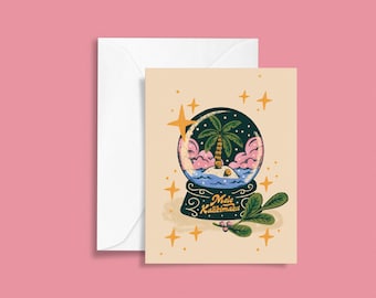 May include: A beige card with a snow globe illustration. The globe contains a palm tree on a small island with blue water and pink clouds. The text "Mele Kalikimaka" is written in a cursive font below the globe. A green leafy branch with red berries is on the right side of the globe.