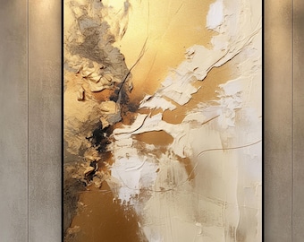 May include: Abstract artwork in a black frame, with a textured design in gold, white, and brown hues. The painting hangs above a grey sofa with decorative cushions. The room has a modern, minimalist style.