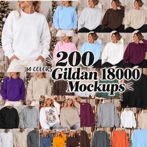 Könnte beinhalten: Eine Kollektion von Gildan 18000 Rundhals-Sweatshirts in 14 verschiedenen Unifarben, darunter Weiß, Hellblau, Rosa, Braun, Lila, Grau, Schwarz und Orange, wobei ein Sweatshirt mit einem Kürbis-Gewürz-Grafikdruck versehen ist.
