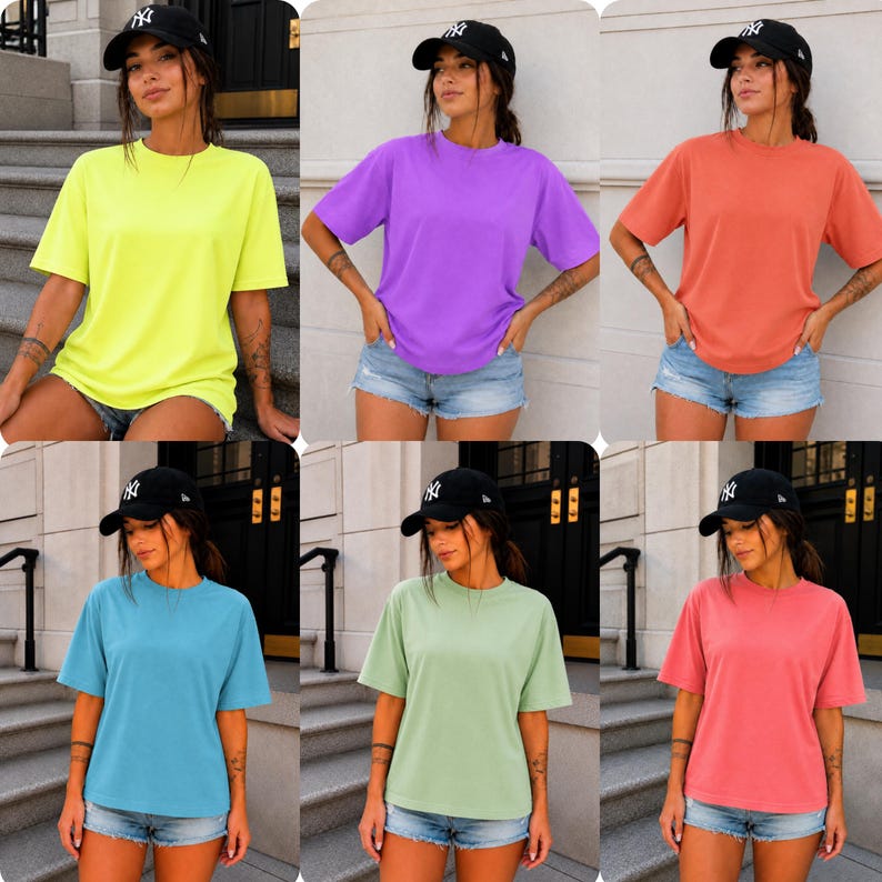 May include: Six short-sleeved t-shirts in a range of colours: yellow, purple, orange, blue, green, and pink. Each top has a crew neck. The shirts are modelled by a person wearing a black baseball cap and denim shorts.
