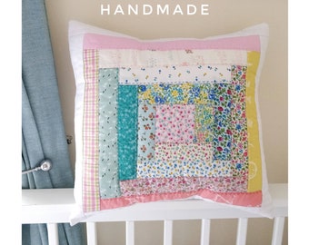 Pastel Log Cabin cushion cover with embroidered hand stitching made by Helen patchwork quilting