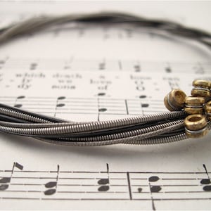 Recycled Electric Guitar String Bracelet silver colored with brass ball ends attached Unisex image 6