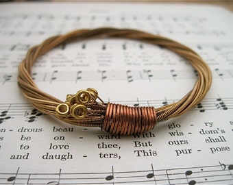 Recycled Acoustic Guitar String Bracelet bronze colored with brass ball ends attached Mens or Womens UNIQUE Gift Custom Orders Available
