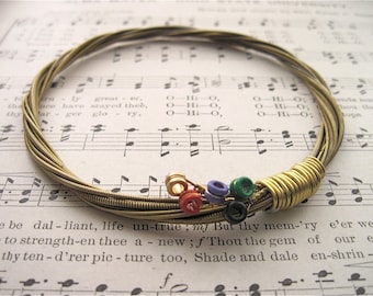 Recycled Acoustic Guitar String Bracelet gold colored with colored ball ends attached Mens or Womens Unique Musician Teacher Gift