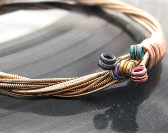 Recycled Acoustic Guitar String Bracelet bronze colored with colored ball ends attached Mens or Womens