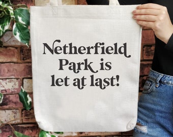 May include: White canvas tote bag with black text that reads "Netherfield Park is let at last!"