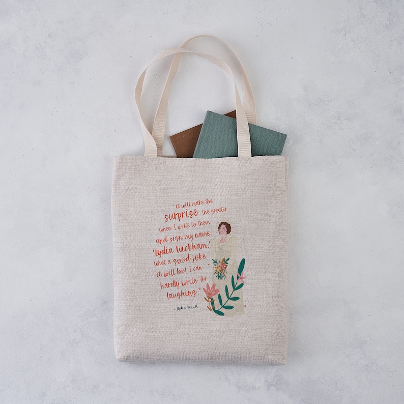 May include: A beige tote bag with a quote from Jane Austen's novel Pride and Prejudice printed on it. The quote reads, "It will make the surprise the greater when I write to them and sign my name 'Lydia Wickham'. What a good joke it will be! I can hardly write for laughing."
