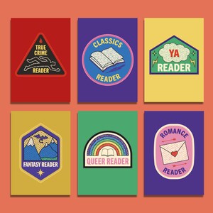 May include: Six colorful patches with book-themed designs. The patches include text such as "True Crime Reader," "Classics Reader," "YA Reader," "Fantasy Reader," "Queer Reader," and "Romance Reader." Each patch has a unique shape and color scheme.
