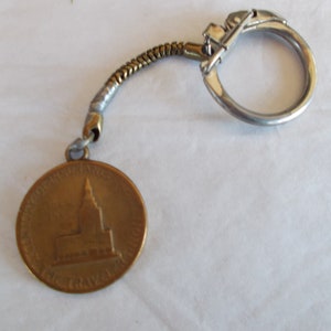 Vintage 100th Anniversary 1864-1964 Travelers Coin Keychain Damage Repair  Chain