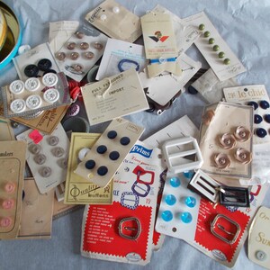 Vintage Metal Can Of  Carded Buttons Carded  Buckles Some Loose Buttons And Buckles