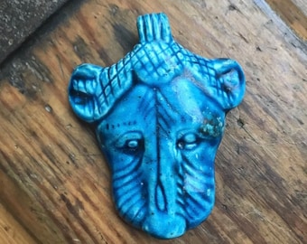 Large old pottery lion head pendant in turquoise glaze