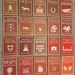 May include: A collection of 16 red and white books with titles about British history, culture, and people. The books are arranged in a grid of four rows and four columns. Each book has a unique illustration on the cover.