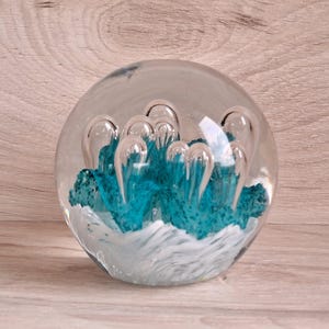 Vintage bubble paperweight, art glass handblown controlled bubble glass paperweight, large bubbles emerging from teal blue and white.