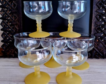Mid Century glass with frosted yellow base, dessert, champagne, party glasses, set of seven.