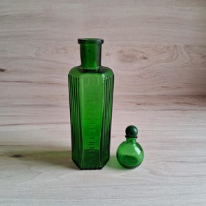 Antique green glass poison and perfume bottles, hexagonal, ribbed &#39;not to be taken&#39; bottle and small Lavender bottle with screw top.