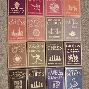 May include: A collection of 12 vintage hardcover books with colorful covers and gold lettering. The books are about British culture, history, and people. The titles include "The English Church", "Wild Flowers in Britain", "British Garden Flowers", "English Children", "English Gardens", "English Diaries and Journals", "The Port of London", "English Pottery and China", "British Photo-Graphers", "British Journalists and Newspapers", "British Chess", and "The Guilds of the City of London".