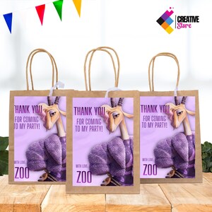 May include: Three brown paper gift bags with handles. Each bag features a purple rectangle with a cartoon gazelle wearing a purple sweater and the text "THANK YOU FOR COMING TO MY PARTY!" and "WITH LOVE ZOO".