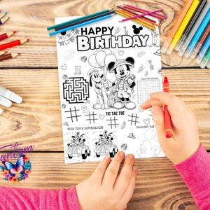 May include: A black and white printable coloring page featuring Mickey Mouse and Pluto in safari outfits. The page includes a maze, tic-tac-toe game, connect the dots, and find the differences activities. The text "Happy Birthday" is at the top of the page.