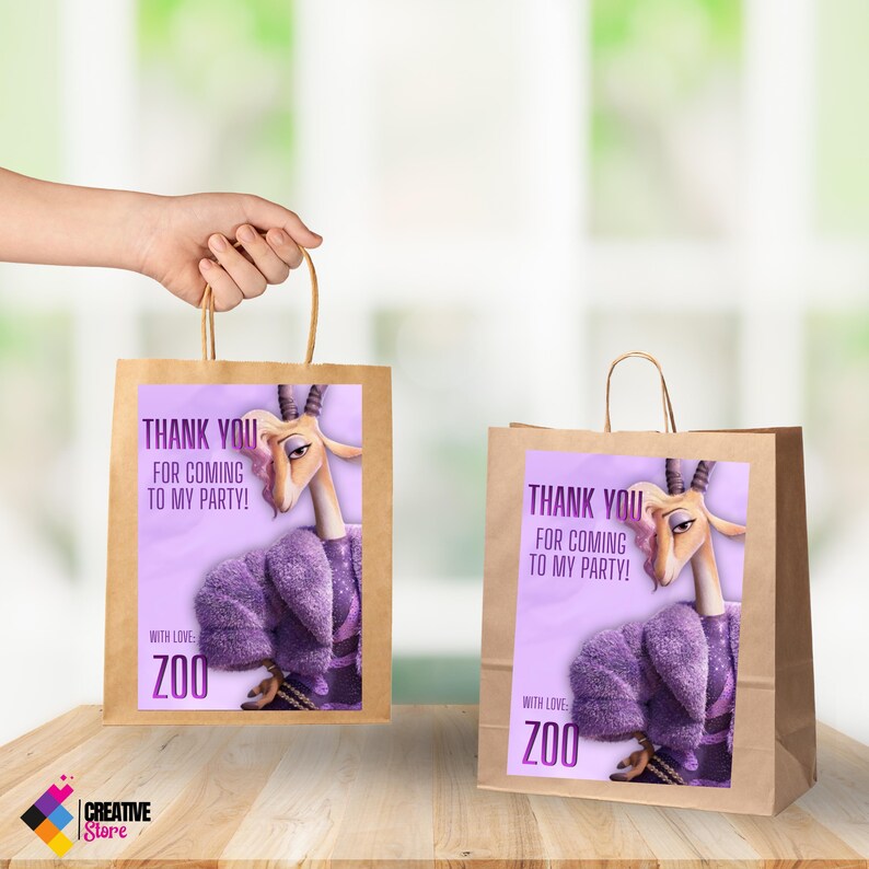 May include: Two brown paper gift bags with handles. Each bag has a purple label with the text "THANK YOU FOR COMING TO MY PARTY!" and a cartoon gazelle wearing a purple coat. The text "WITH LOVE ZOO" is also on the label.